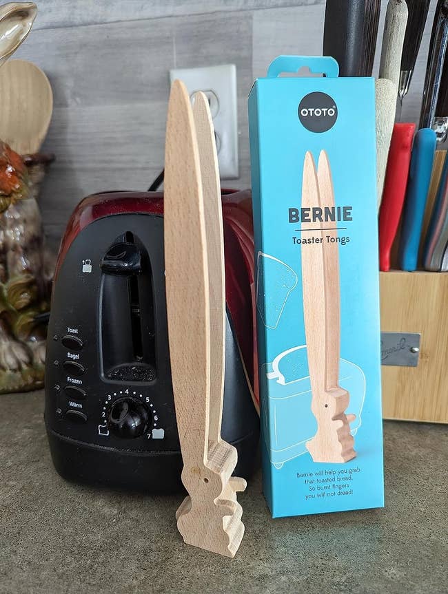 the wooden toaster tongs named 