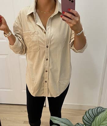 Reviewer wearing the shirt buttoned in beige