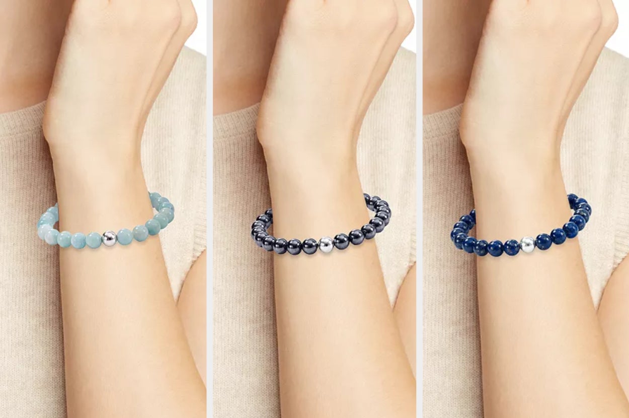 Models wearing a teal, gray, and navy blue beaded bracelet with silver center bead, and wearing a tan sweater bracelet
