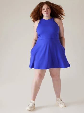 a different model wearing the sam dress but in blue