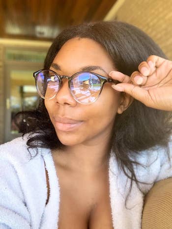 reviewer in black and grey glasses