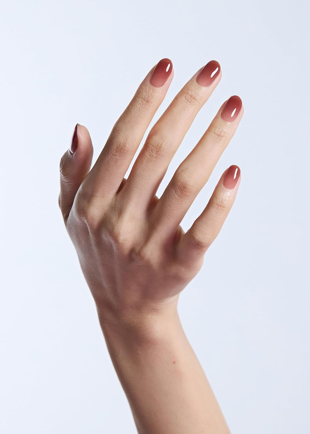 closeup of manus  with the Fig Jam nails applied