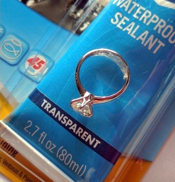 Reviewer using the sealant as a way to size a wedding ring down