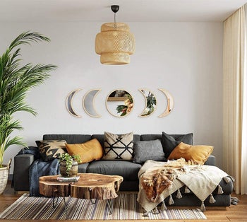 the mirrors over a couch