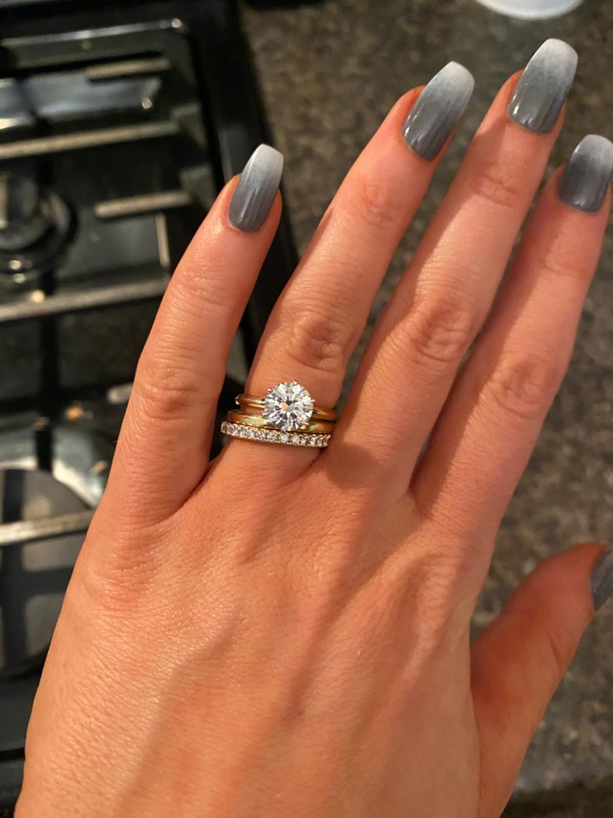 reviewer's diamond ringing  sparkling connected  their hand