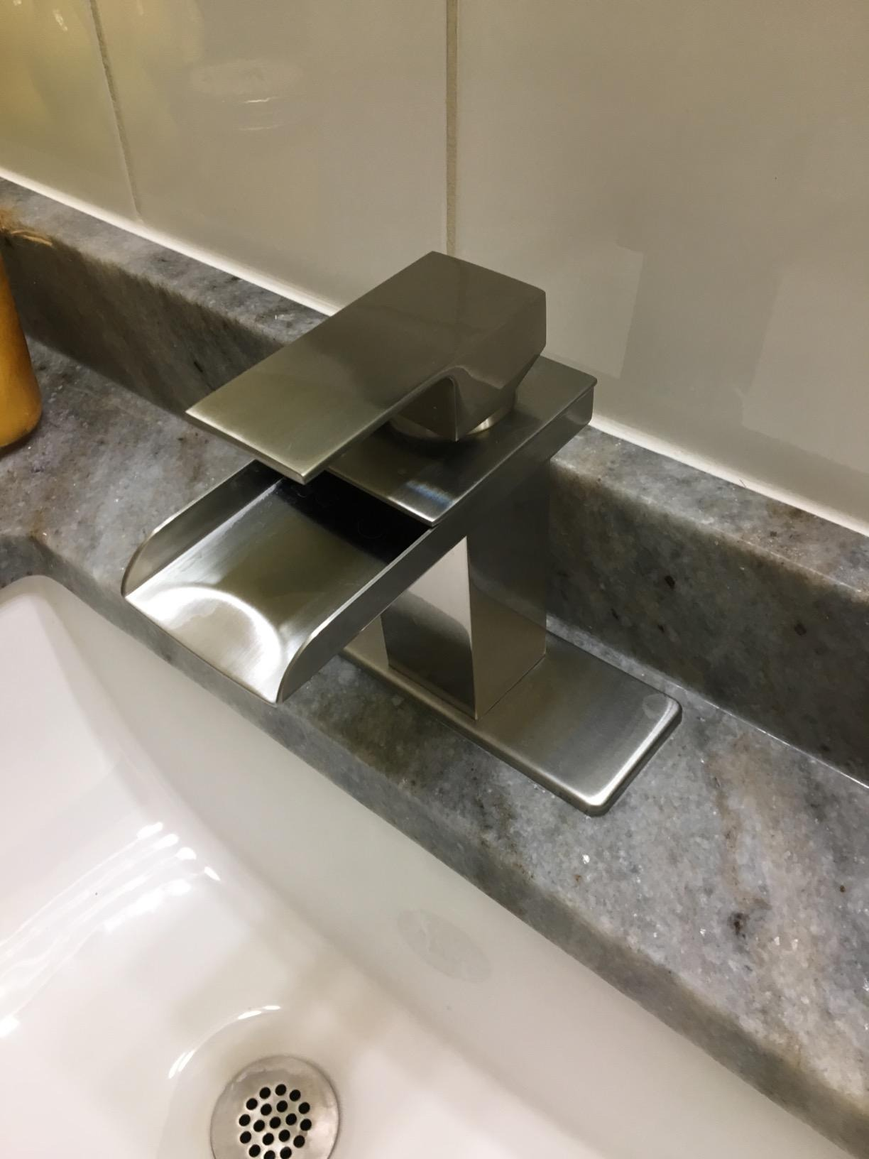 reviewer image of the brushed nickel waterfall faucet
