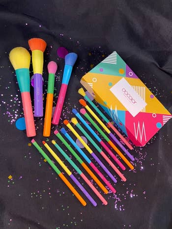 reviewer image of the colorful makeup brushes