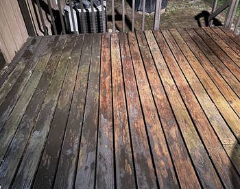 reviewer image of a deck being washed with half of it looking gray and dull, and the other half cleaned 