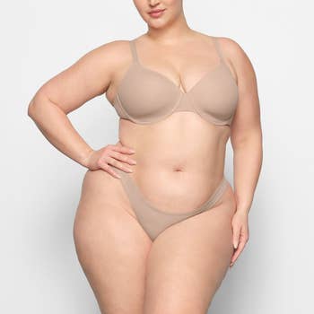 another model wearing the t-shirt bra in mica nude shade