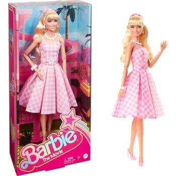 the Barbie modeled after the movie wearing a pink gingham dress