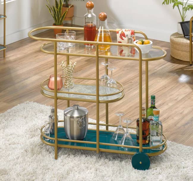 Image of gold and blue bar cart
