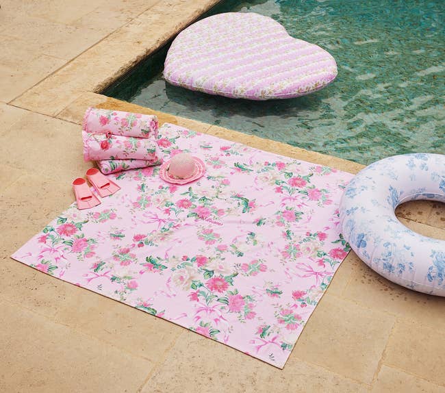 a pink floral loveshackfancy oversized towel