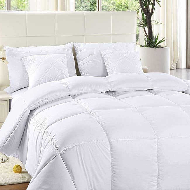 white duvet on a bed