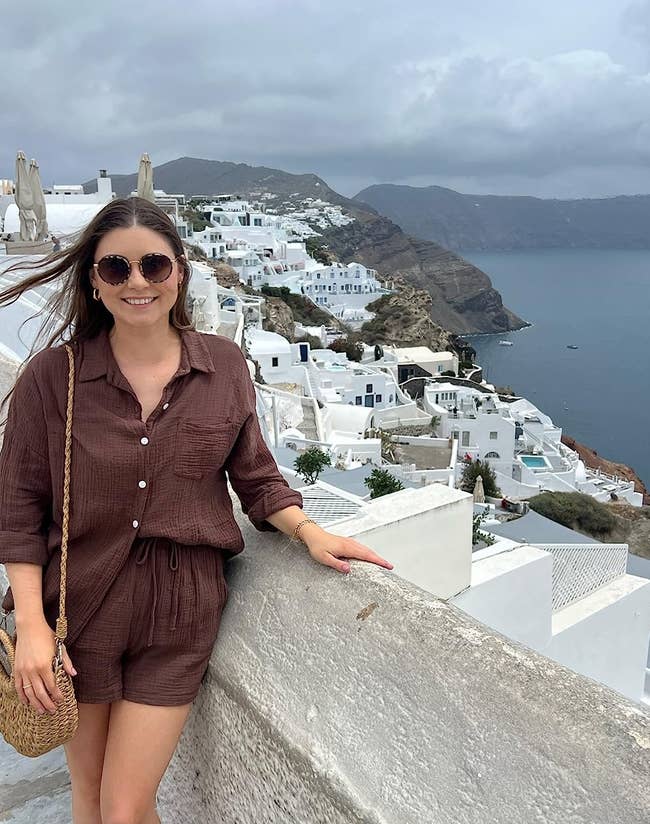 a reviewer wearing the brown set while in Greece