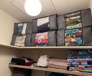 A closet organizer with various folded items on shelves, optimizing space for efficient storage