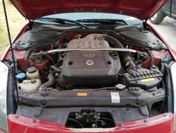 reviewer's car engine dirty