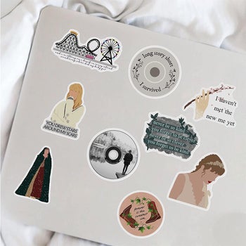 a laptop with some of the stickers on it