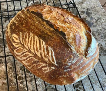 reviewer's sourdough bread with floral flour outline