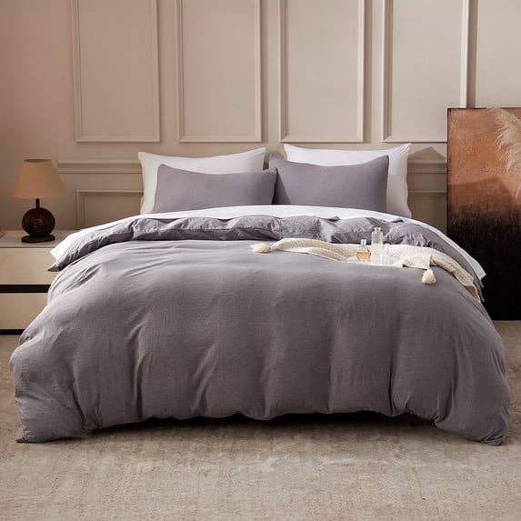 Cozy chamber  with a neatly made furniture  featuring fluffy pillows and a plush comforter; stylish partition  panels make  an elegant atmosphere