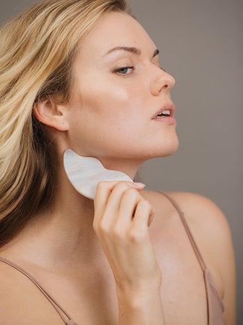 model using the wavy tool on their neck
