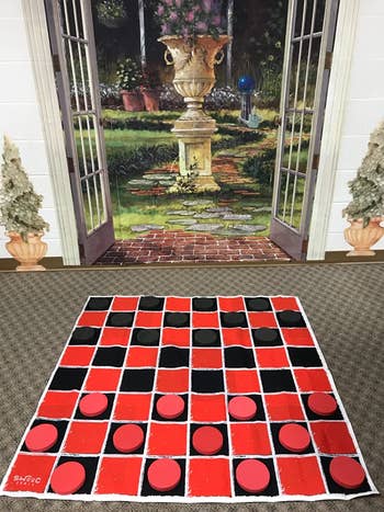 reviewer photo of the game mat being used for checkers