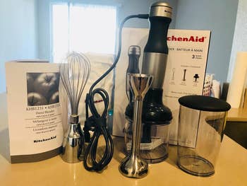 A reviewer's blender with everything that the kit comes with