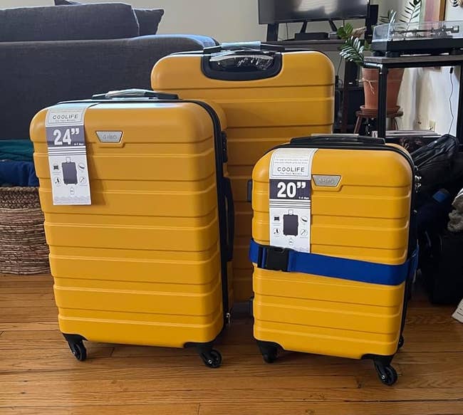 reviewer's set of yellow suitcases