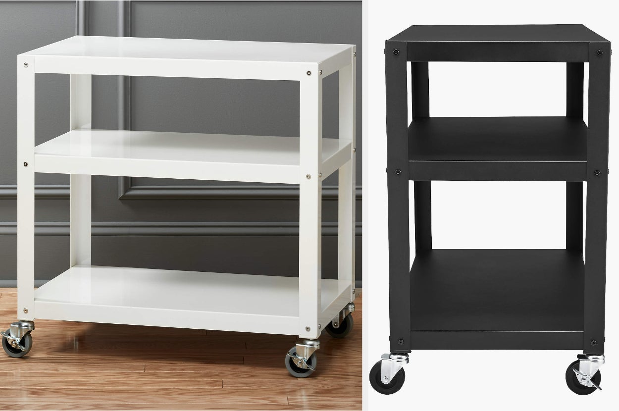 White three-shelved microwave cart with nothing on it in front of gray wall, side-view of product in black