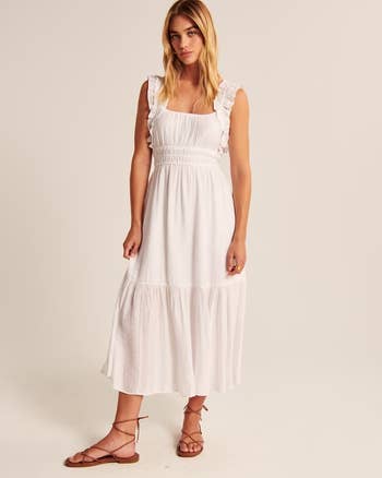 model wearing the dress in white