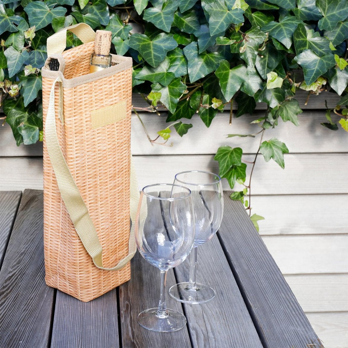 wicker wine cooler with a bottle inside