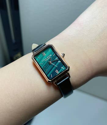 reviewer wearing the watch