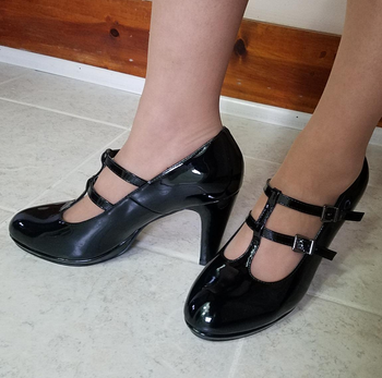 Reviewer wearing black heels