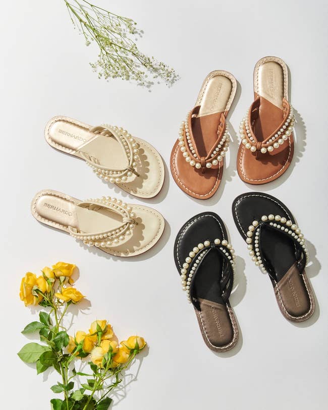 the pearl-encrusted flip flops in white, black, and brown