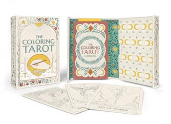The Coloring Tarot kit featuring a guidebook and tarot cards designed for coloring