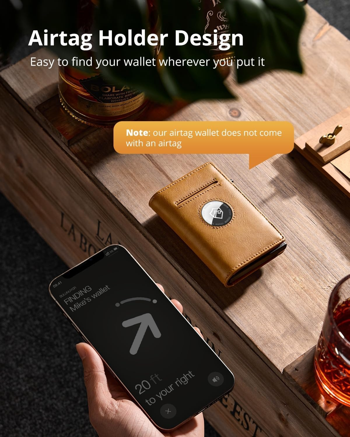 A person holds a phone showing an airtag tracking app. A wallet with an airtag slot is on the table. Note: Airtag not included with wallet