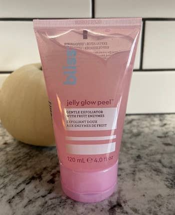 A pink container of the glow peel 
