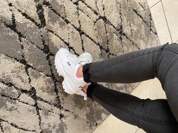 reviewer wearing the sneakers