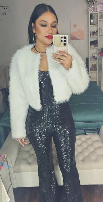 reviewer wearing the achromatic jacket