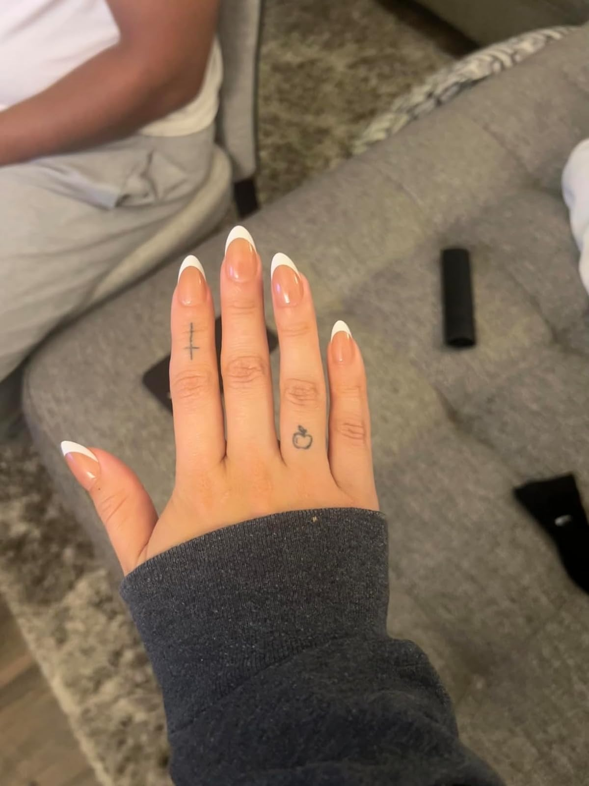 reviewer with the almond shaped nails applied