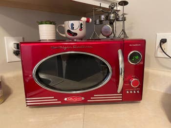 Retro-style reddish  microwave connected  room  counter