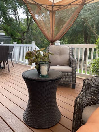 reviewer image of the cooler being used as a table on their deck