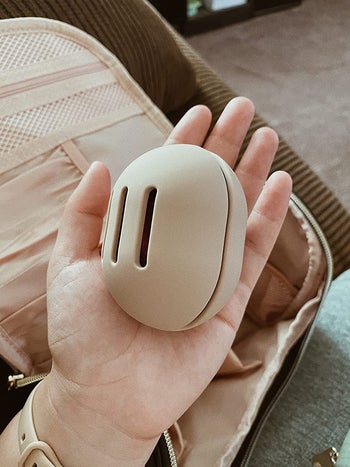 image of another reviewer holding up a closer sponge holder