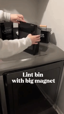 GIF of seller demonstrating attaching the lint bin on the side of washer