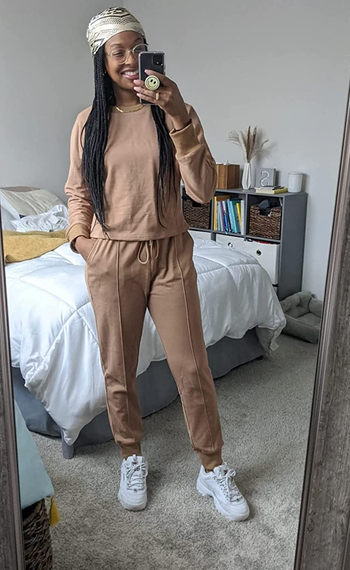 a reviewer in the tan set and a matching head scarf