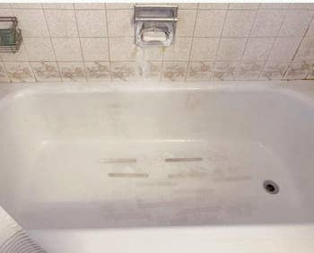 Before of a dirty bath tub