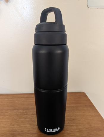 a reviewer photo of a black water bottle