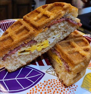 A waffle stuffed with eggs and ham 