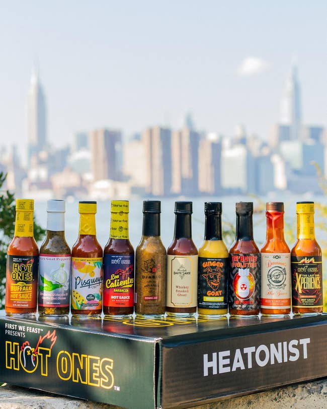 the 10 hot sauce bottles sitting on the gift box