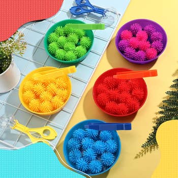 The acceptable   of 5  colorful bowls with matching balls and tweezers for each