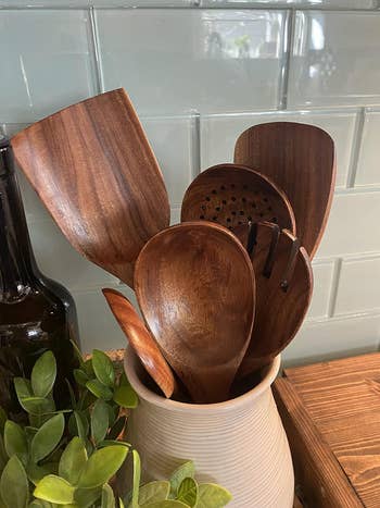 the wooden spoons in a container